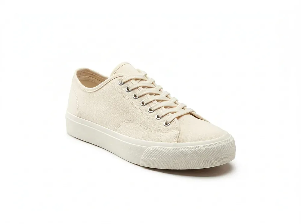 Off-white low-top canvas shoe